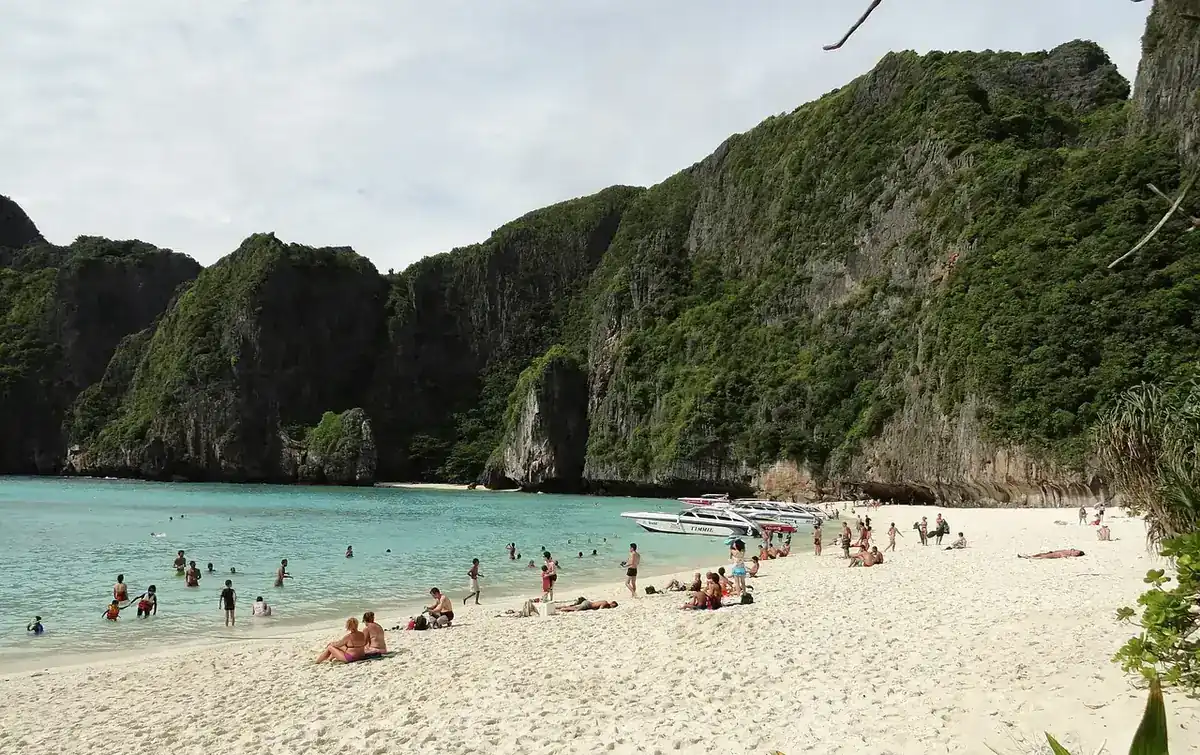 Thai beach with a longtail boat